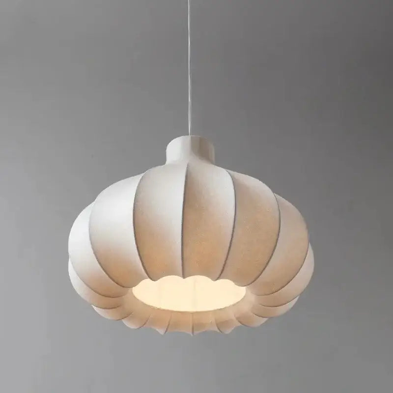 A soft white pleated paper led pendant light from decorbites offering warm glow and retro simplicity for home decor
