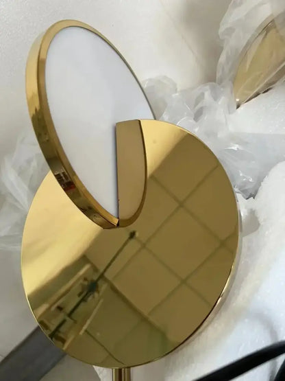 Gold-finished double-sided vanity mirror with sleek modern design and reflective surfaces paired with decorbites led pendant light