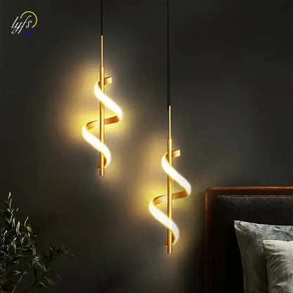 Two elegant gold-toned decorbites led pendant lights with warm glowing illumination for modern nordic home decor