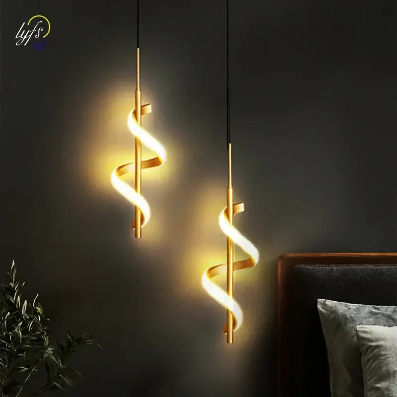 Two elegant gold-toned decorbites led pendant lights with warm glowing illumination for modern nordic home decor