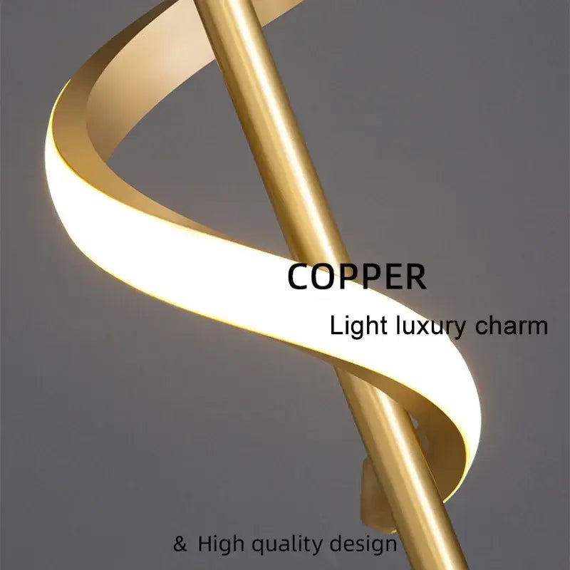 A sleek spiraling copper decorbites led pendant light with warm glow for modern nordic home decor