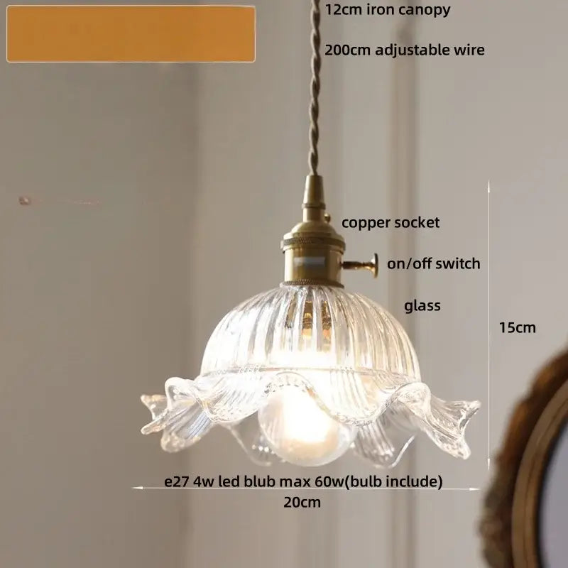 A delicate clear glass pendant light with fluted design and antique brass socket from DecorBites led pendant lights
