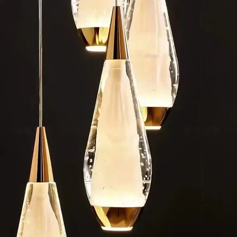 Decorbites led pendant staircase chandeliers with modern teardrop clear glass and gold metal accents for living room lighting