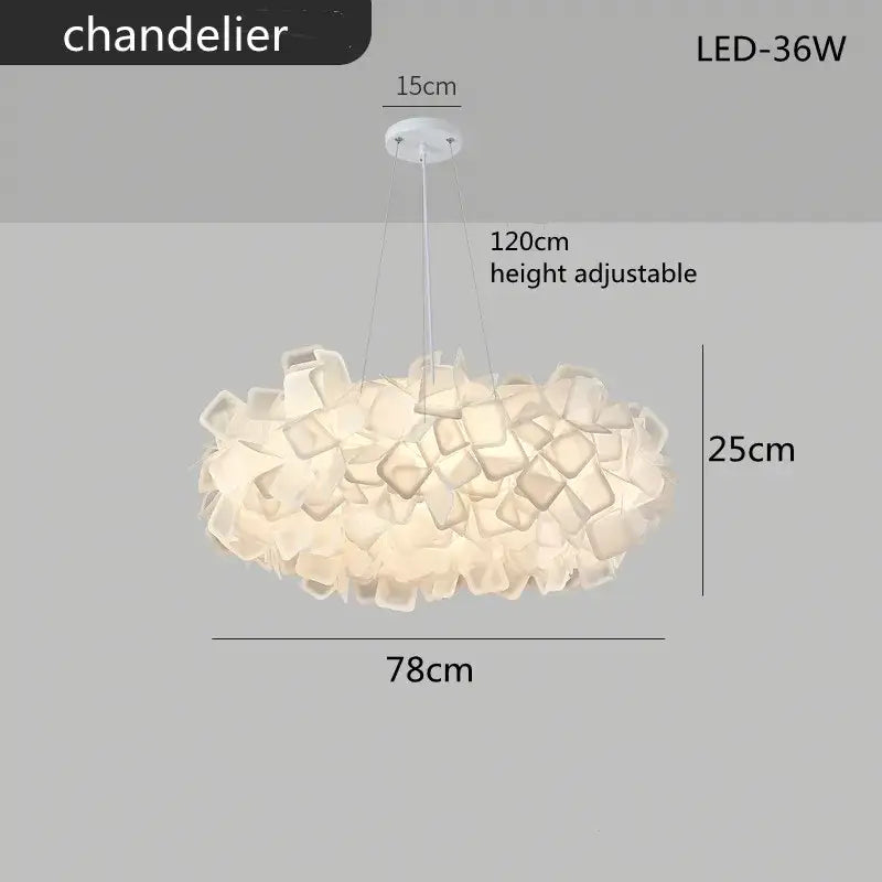 A modern off-white decorbites led petal chandelier with translucent geometric acrylic pieces for living room use