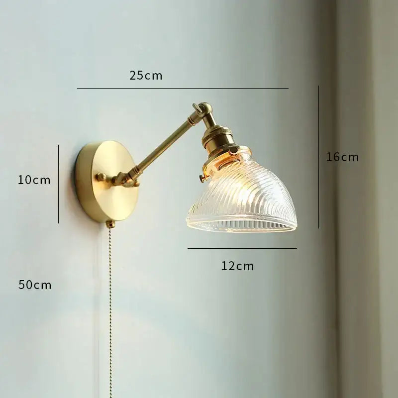 Vintage-style brass decorbites led petal wall sconce with ribbed translucent glass shade and pull chain switch