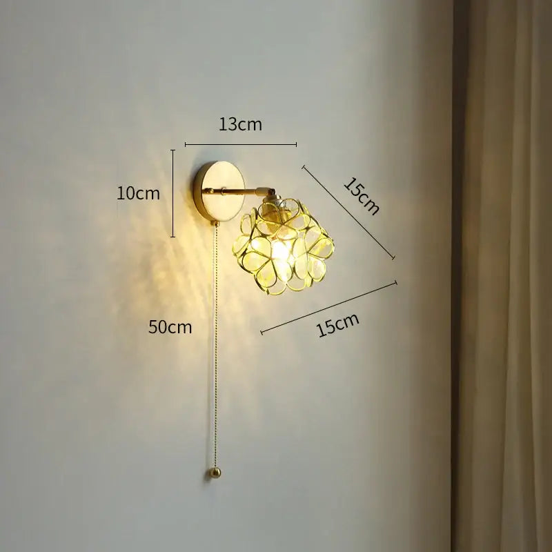 Gold-toned decorbites led petal wall sconce with flower-like glass shade and adjustable pull chain switch