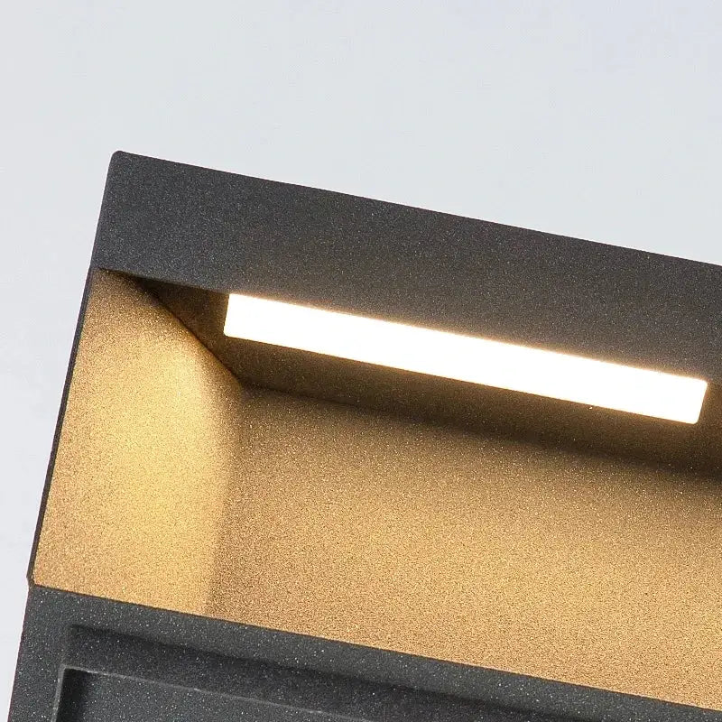 Modern black and gold decorbites led pillar outdoor wall light with sleek rectangular design for courtyard fence posts