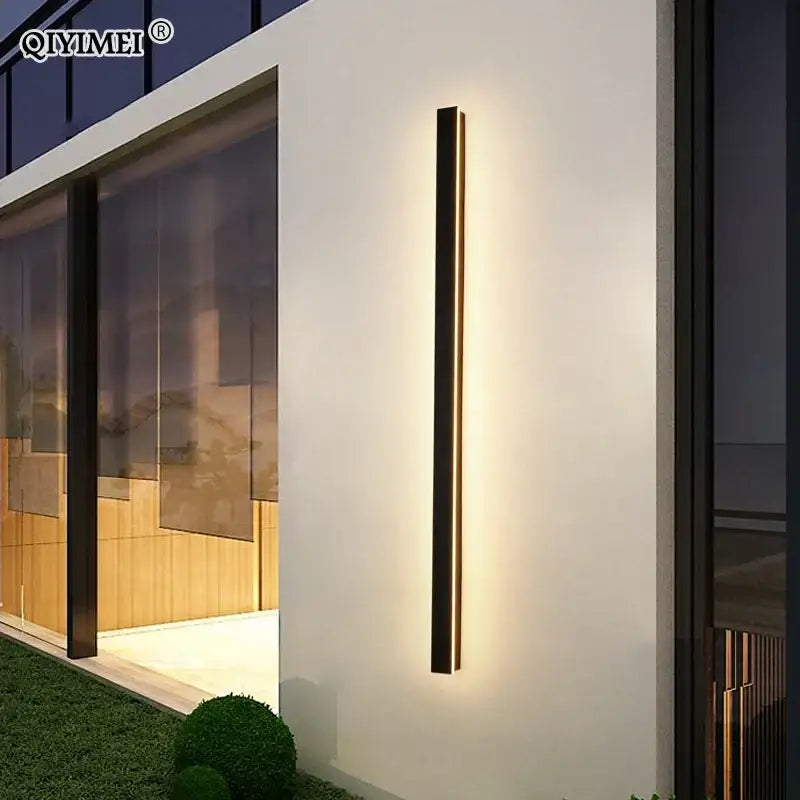 Modern black rectangular decorbites led porch wall sconce with warm ambient lighting for outdoor living spaces