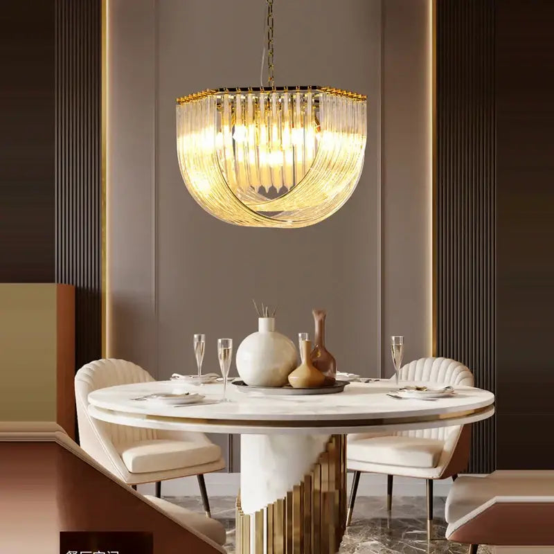 Decorbites led postmodern gold silver chandelier with cascading crystal prisms above modern dining table lighting