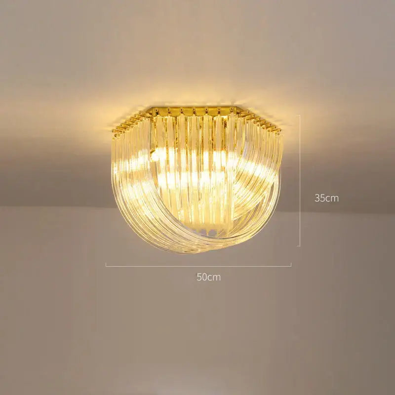 Golden-framed decorbites led postmodern chandelier with cascading clear glass rods for foyer lighting