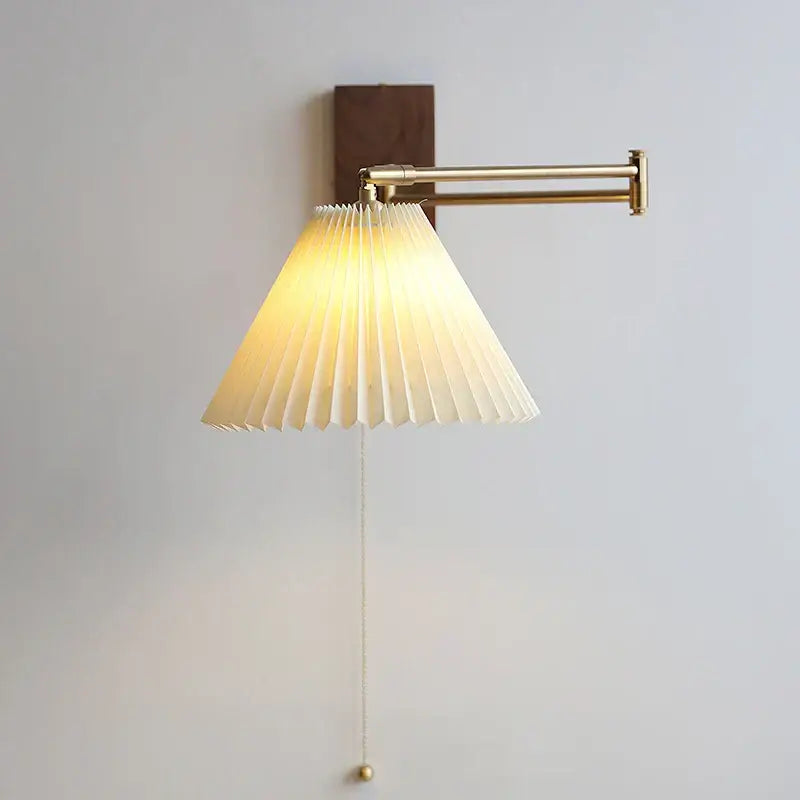 Decorbites led pull chain wall lamp with warm-toned pleated paper shade and brass adjustable bracket for bedroom use