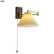 Warm-toned brass decorbites led pull chain wall lamp with pleated off-white shade and adjustable arm for bedroom and living room