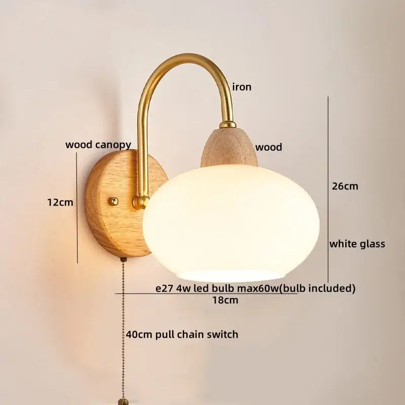 Decorbites led pull chain wall light with brass iron arm, wooden base, and oval white glass shade for bedroom decor