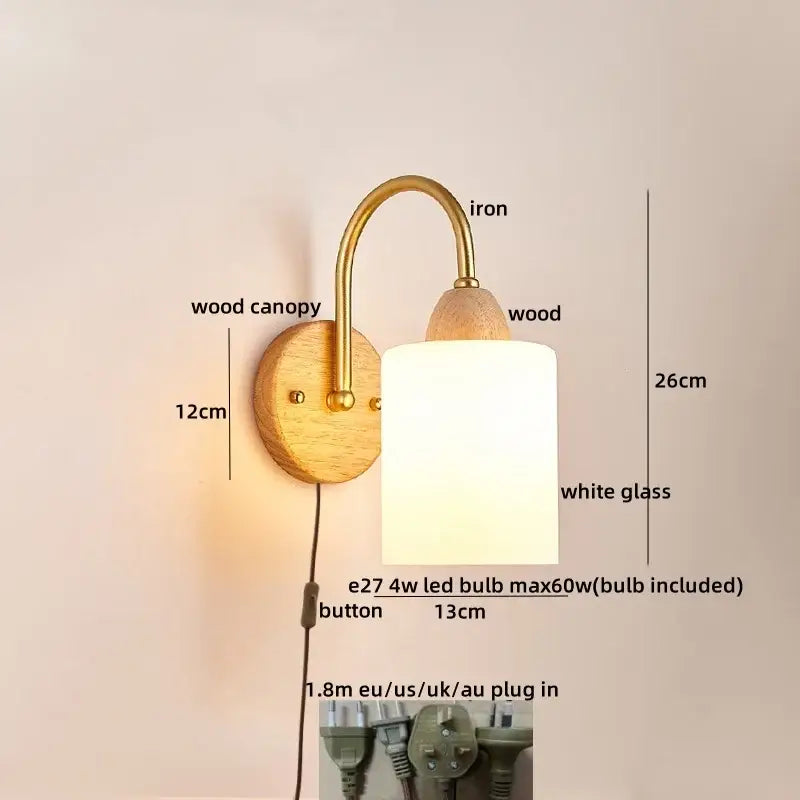A warm-toned decorbites led pull chain wall light with brass iron arm, wooden base, and frosted white glass shade