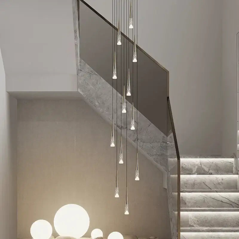 Modern minimalist decorbites led rain drop chandelier with slender metallic rods and clear crystal droplets in cascading design