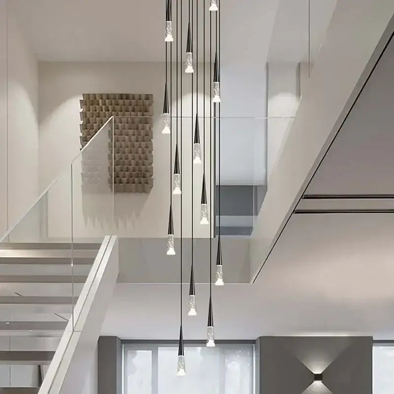 Modern minimalist DecorBites LED Rain drop pendant light with slender black and clear glass shades for staircase lighting