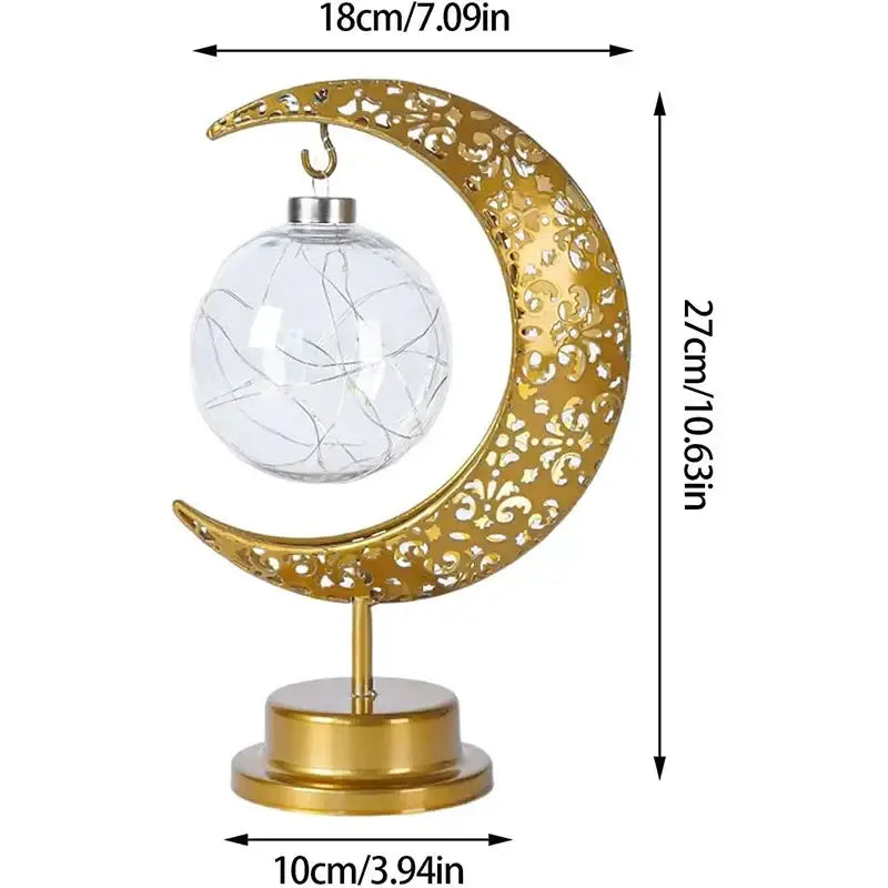 Golden crescent moon-shaped table lamp with intricate cut-out patterns and clear glass globe with wire lights decorbites led ramadan