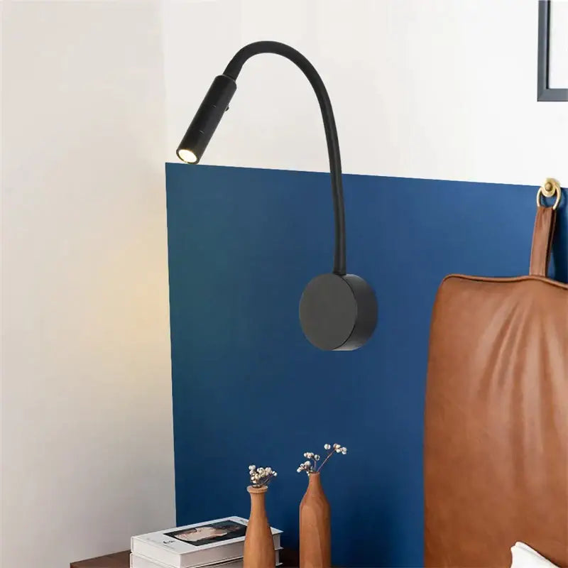 Black gooseneck DecorBites led reading wall lamp with flexible arm and circular base for bedroom and study lighting