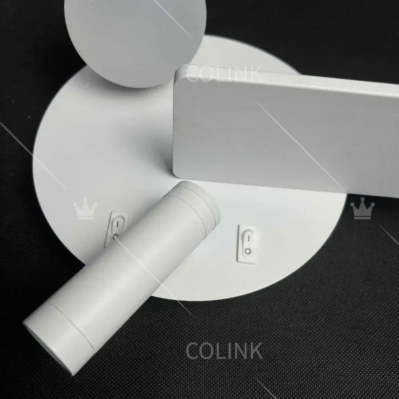 White minimalist decorbites led reading wall lamp with sleek cylindrical and rectangular components and usb charging