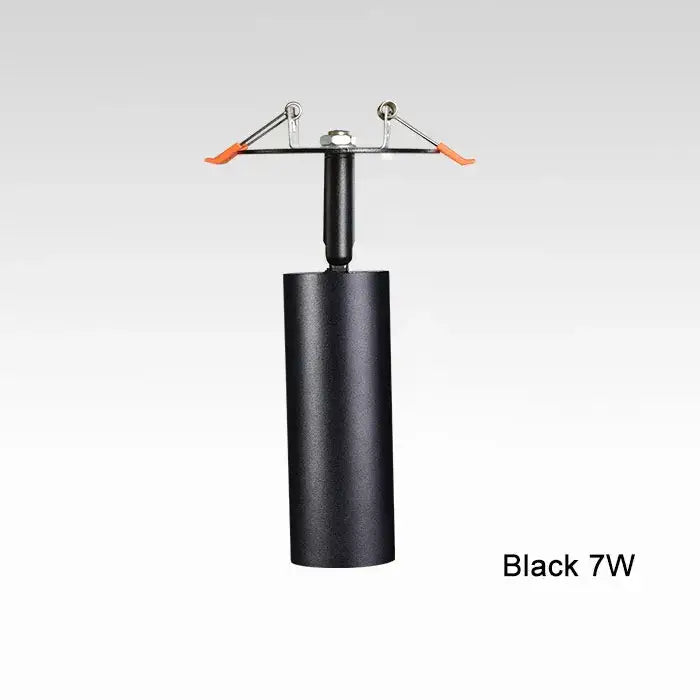 Black cylindrical matte decorbites led recessed ceiling light with orange-tipped mounting arms for kitchen use