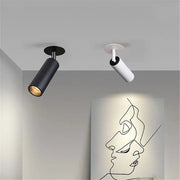 Two modern decorbites led recessed ceiling lights in matte black and white with sleek cylindrical design for kitchen use