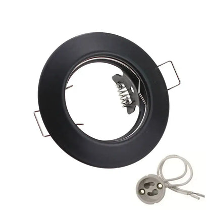 Black matte decorbites led recessed spotlight fixture with metallic spring-loaded mechanism and mounting tabs