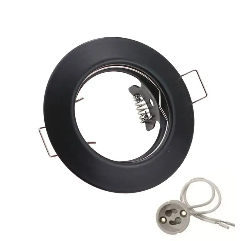Black matte decorbites led recessed spotlight fixture with metallic spring-loaded mechanism and mounting tabs