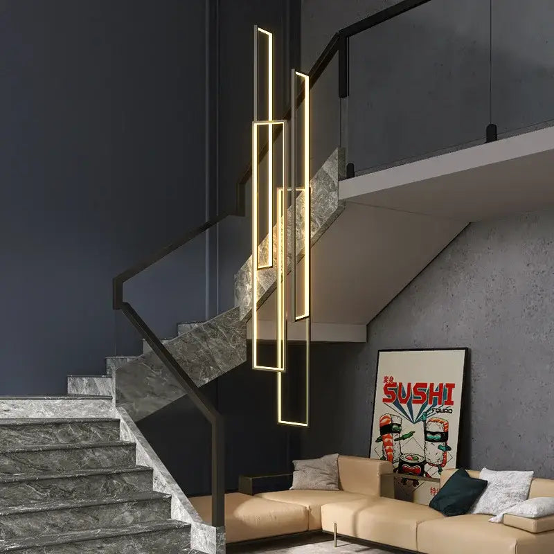 Modern gold-accented decorbites led rectangle pendant lighting hanging beside staircase for modern living room decor