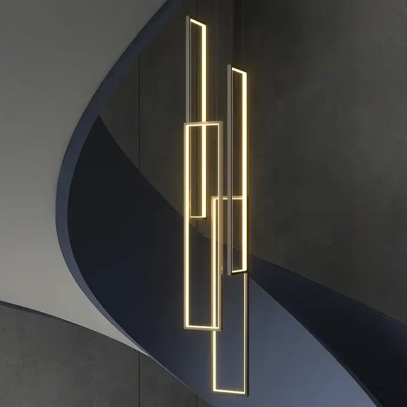 Modern geometric pendant light with glowing gold led strips forming overlapping rectangular frames by decorbites led rectangle staircase chandelier