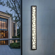 Modern black-framed decorbites led rectangle wall lamp with geometric glass panels emitting warm light for stairs and parlor