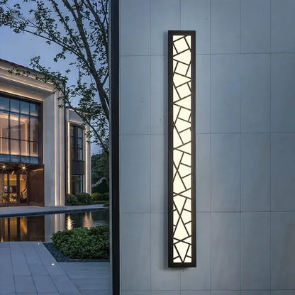 Modern black-framed decorbites led rectangle wall lamp with geometric glass panels emitting warm light for stairs and parlor