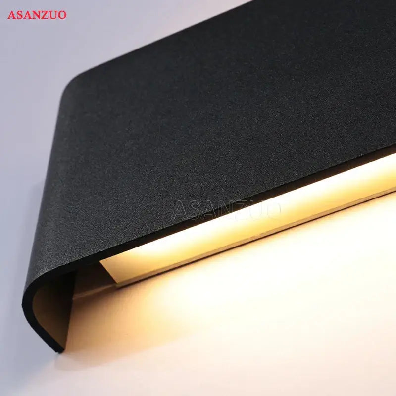 Black textured decorbites led rectangle wall lamp with sleek modern design and warm glow for indoor use