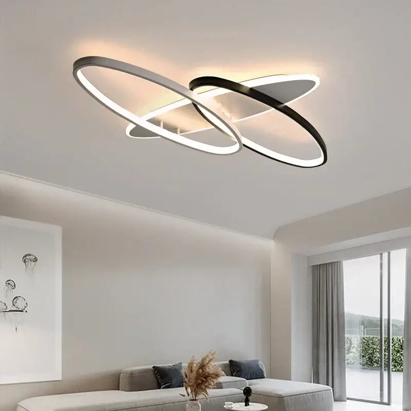 Modern minimalist decorbites led rectangular chandelier with two interlocking black and silver oval rings and integrated led lighting
