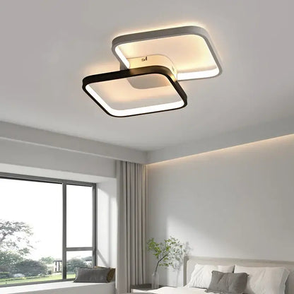 Modern decorbites led rectangular chandelier with black and white frame emitting warm ambient light for living room and bedroom