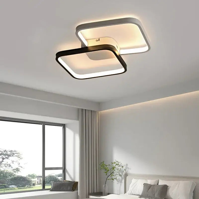 Modern decorbites led rectangular chandelier with black and white frame emitting warm ambient light for living room and bedroom