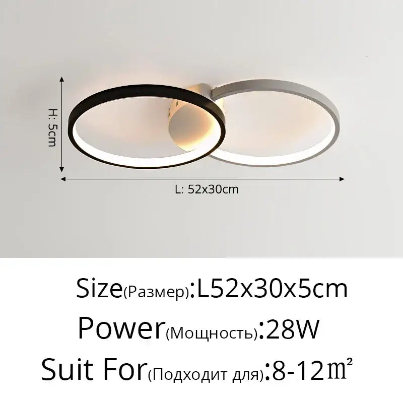Modern minimalist decorbites led rectangular chandelier with interlocking black and white rings in sleek metallic finish