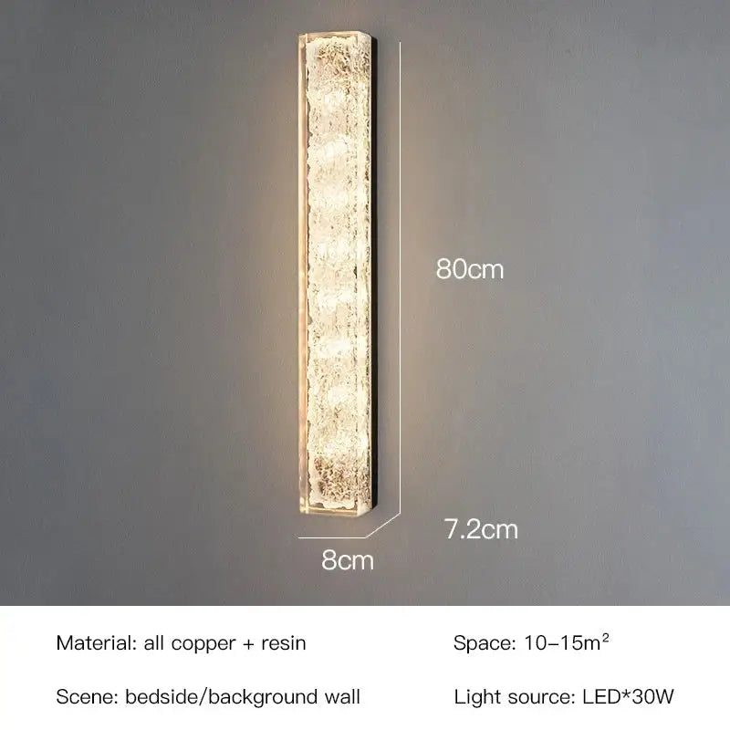 A sleek 80cm decorbites led resin wall lamp with textured copper finish emitting warm LED light for bedroom and living room