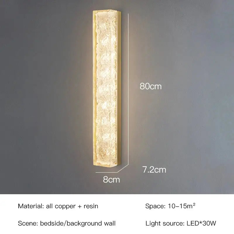 A sleek 80cm tall rectangular decorbites led resin wall lamp with textured resin and copper frame for bedroom and living room