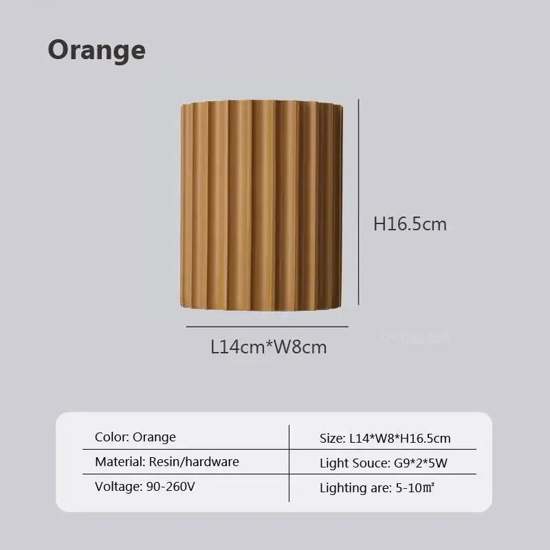 Orange cylindrical resin wall sconce with vertical fluted ridges decorbites led resin minimalist illumination