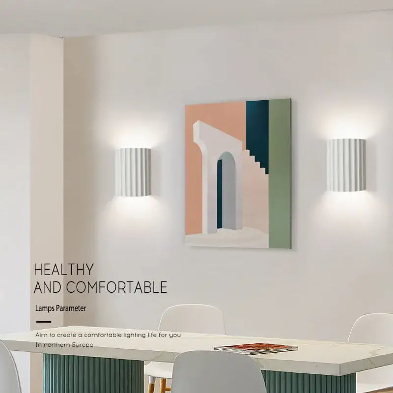 White vertically ribbed decorbites led resin wall sconces in minimalist design for entryway living bedroom illumination