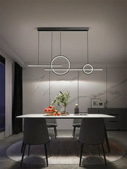 Modern minimalist decorbites led restaurant chandelier with sleek black metal frame and circular led rings for dining rooms