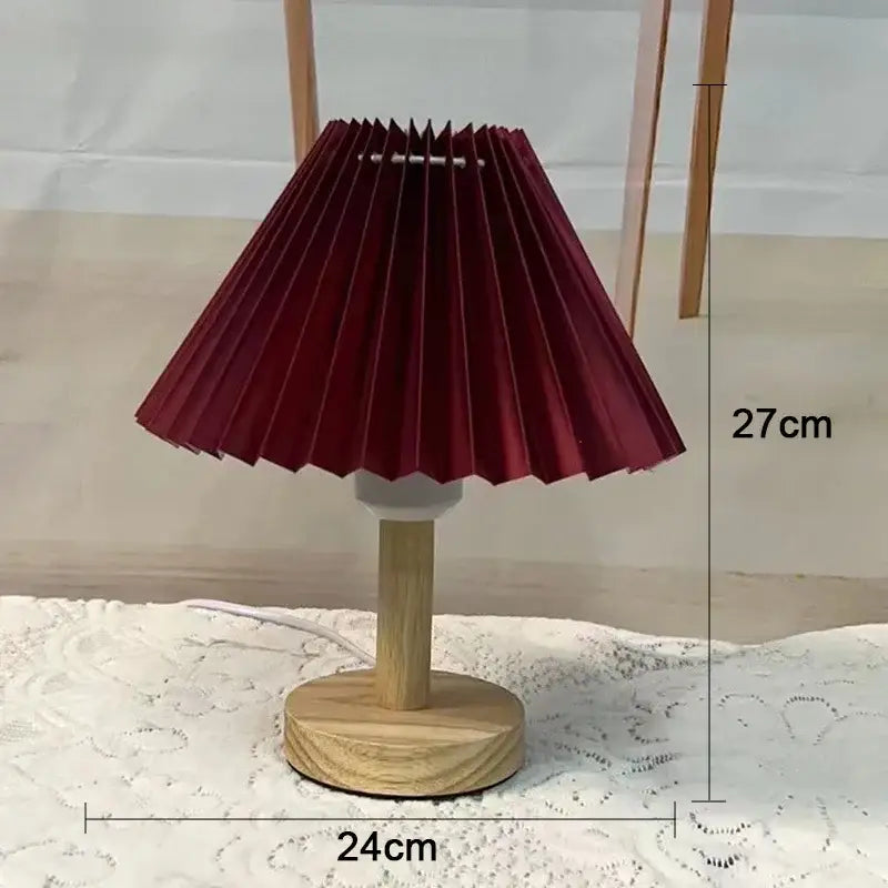 A maroon pleated paper lampshade on a light wood base decorbites led retro table lamp with usb plug for interior lighting