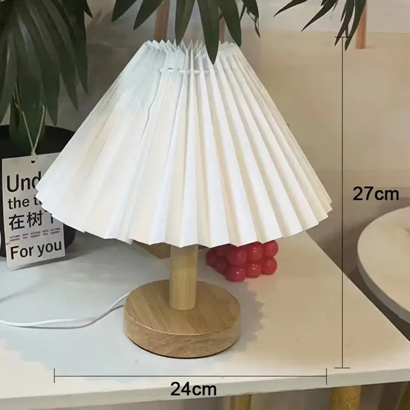 White pleated paper lampshade with wooden base on decorbites led retro table lamp for interior lighting