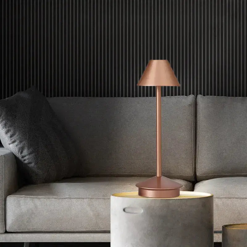 Copper-toned decorbites led retro touch minimalist table lamp with sleek tapered design and matte metal base
