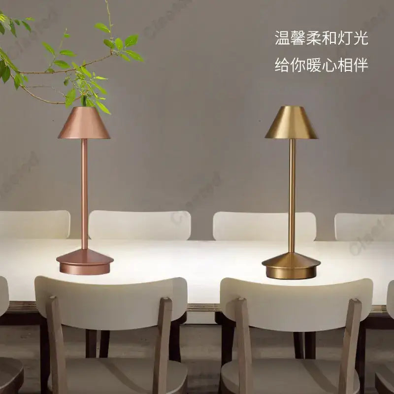 Two modern decorbites led retro touch table lamps with slender metallic stems in rose gold and brass conical shades