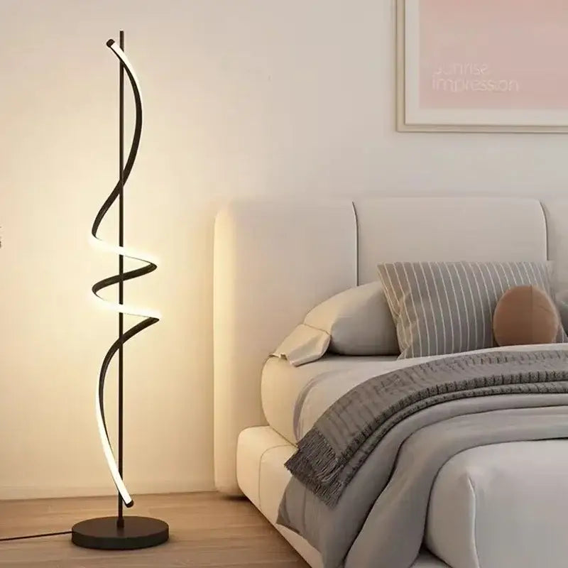 Modern black DecorBites LED Revolve floor lamp with sleek spiral design and warm white light for indoor decor