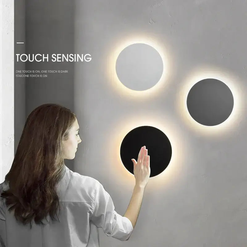 Modern circular decorbites led rgb wall lights with black and white acrylic finish and soft glowing rings for indoor decor
