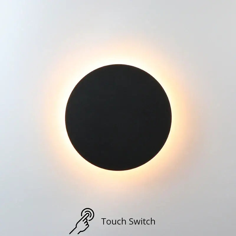 Black circular DecorBites LED RGB round wall lights with acrylic touch sensor and warm glowing light ring for indoor decor