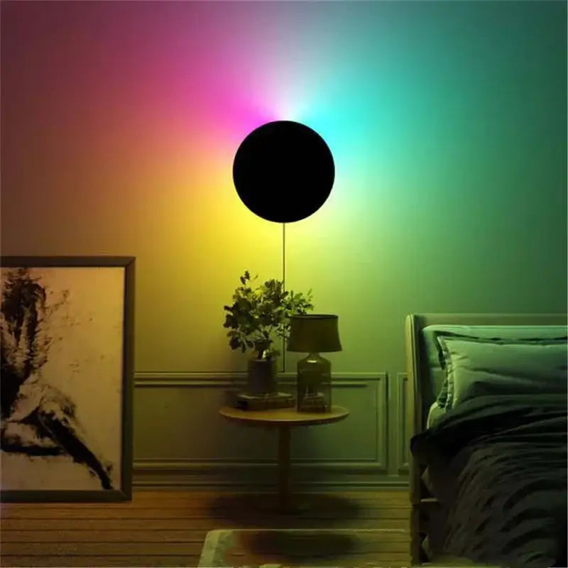 A sleek black decorbites led rgb round wall light with acrylic touch sensitive surface emitting vibrant rainbow glow