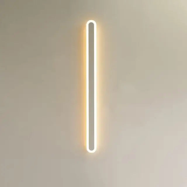 A sleek vertical decorbites led rgb wall light with minimalist design and warm white illumination for indoor decor